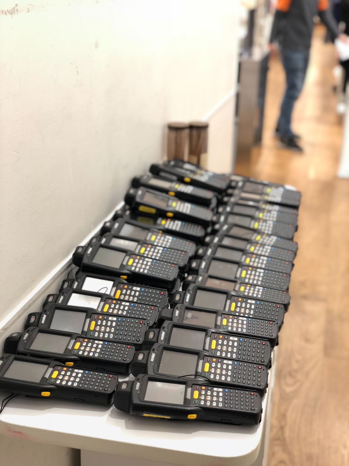 Rows of handheld terminals prepared for a retail stocktake in Hong Kong